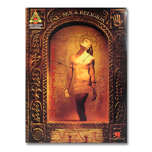 image of the sex and religion album artwork on a guitar tab book against white background. the artwork has heiroglyphics all around it in a dark gold color. some symbols are a hand with an eye in the center, a stick figure person, and plants. in the center of the artwork in gold color is a person from the knees up with their hands by their sides, slightly away from their body. they look upwards with their eyes shut. to the left of this descending down the artwork reads "sex & religion".