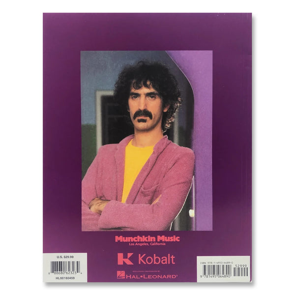 back of the frank zappa guitar book. the back is a purple color and features a photo of frank zappa with curly dark hair and a mustache. frank wears a yellow shirt with a pink/purpleish blazer over it, arms crossed. below him in an orange pink text reads "munchkin music, los angeles california." the kobalt and hal leonard logos are below this. 