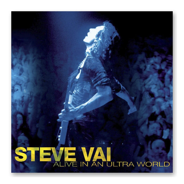 album artwork for the steve vai "alive in an ultra world" cd. the artwork is a blue colored image of steve standing in a crowd of people, playing guitar. steve is shown from the side profile, looking to the left of the artwork. below steve in yellow text reads "steve vai, alive in an ultra world". 
