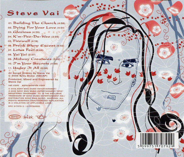 image of the back of the real illusions: reflections album artwork. in red text reads "steve vai" followed by the tracklisting for the album. The artwork to the right of the tracklisting is a man with long black curly hair looking forward. red and pink flowers surround him. light blue tree branches frame around his face.