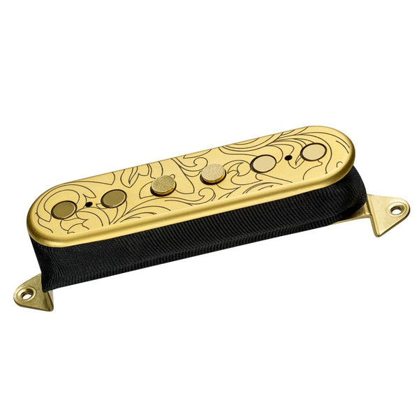 oval shaped gold and black guitar pickup against white background. the top of the pickup has thin lined swirled lines across it to make abstract designs.