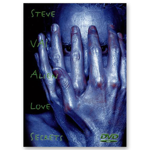 Image of the steve vai alien love secrets dvd case. there is a black cover with a person covered in blue and silver paint photographed from the neck up. their hands cover their face but you can only see their eyes. to the left of this in green descending text reads "steve vai, alien love secrets" . the bottom right corner has a DVD logo with a disk underneath the letters DVD. this is in green and black.