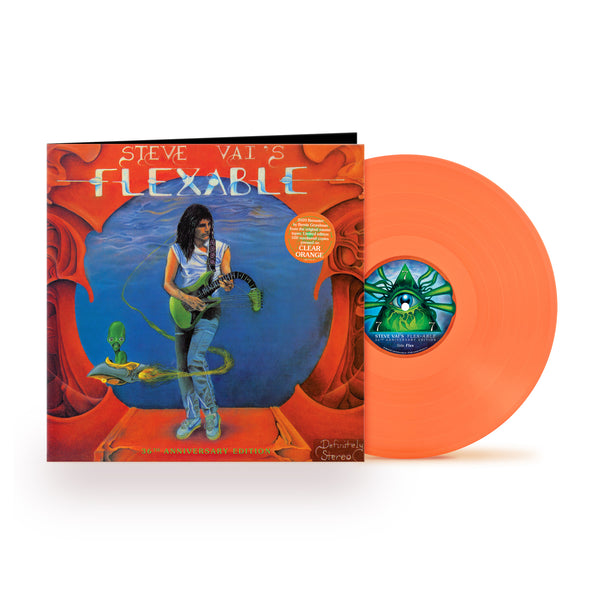 image of a vinyl sleeve and orange vinyl against white background. the artwork is red with a blue circle in the center. standing by the blue circle is steve vai playing a green guitar. the neck of the guitar droops down. swirling around steve is an alien in a small ship. above this in blue and white text reads "steve vai's flexable".