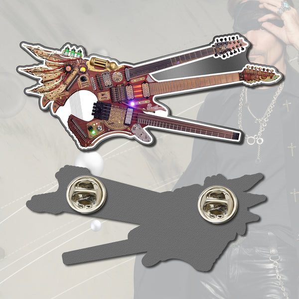 Image of the front and back of an enamel pin against a transparent background that has steve vai standing in the background wearing all black and a blindfold over his eyes. the front of the pin is an electric guitar that has 3 necks on it. the back of the pin is gray and shows two spots for the pin to attach to something, with the removable backs attached to the pin.